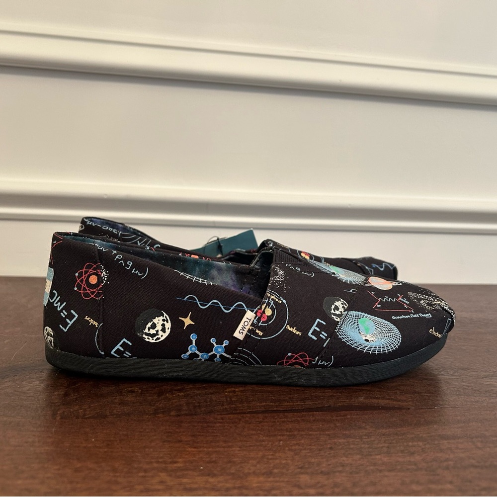 Toms Women’s Classic Glow in the Dark Cosmic Wonder Print Canvas Slip On Shoes
